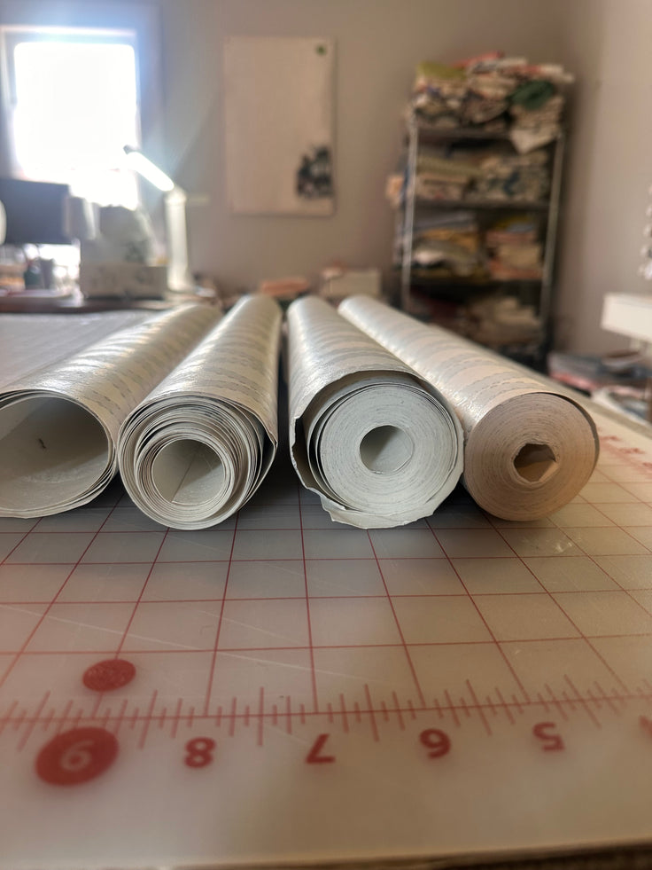 2 full and 2 partial rolls of Wallpaper