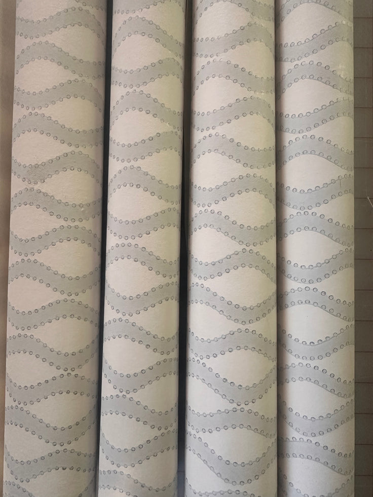 2 full and 2 partial rolls of Wallpaper